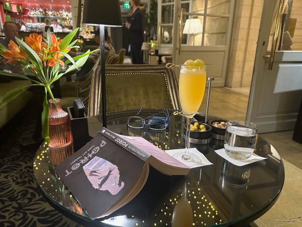 Cocktails and a book on a table